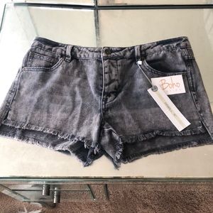 Distressed denim shorts